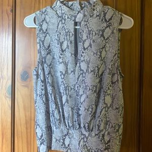 Silk sleeveless top with keyhole front